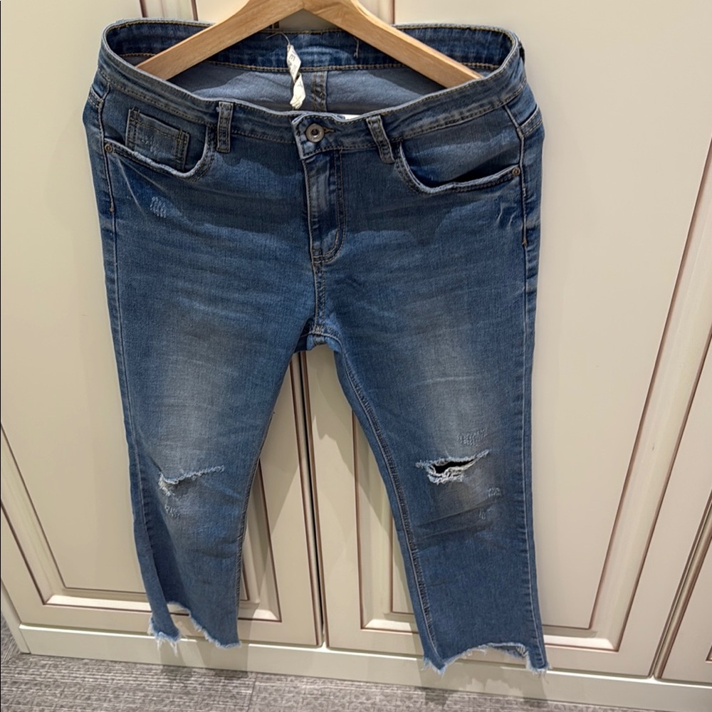 Distressed Blue Jeans